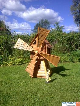 Продаю декоративную деревянную мельницу для украшения участка.