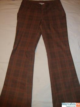 Продаю клетчатые расклешенные штаны.