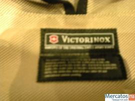 швейцарского производства фирмы VICTORINOX черная дорожная сумка 4
