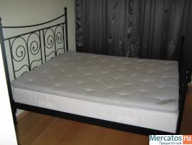 Продам двуспальную кровать Noresund (IKEA) с двумя матрасами
