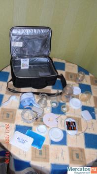 Электронный молокоотсос